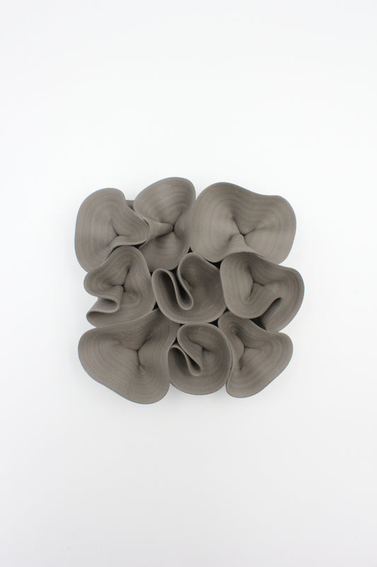 Vägghängd skulptur, lakrits