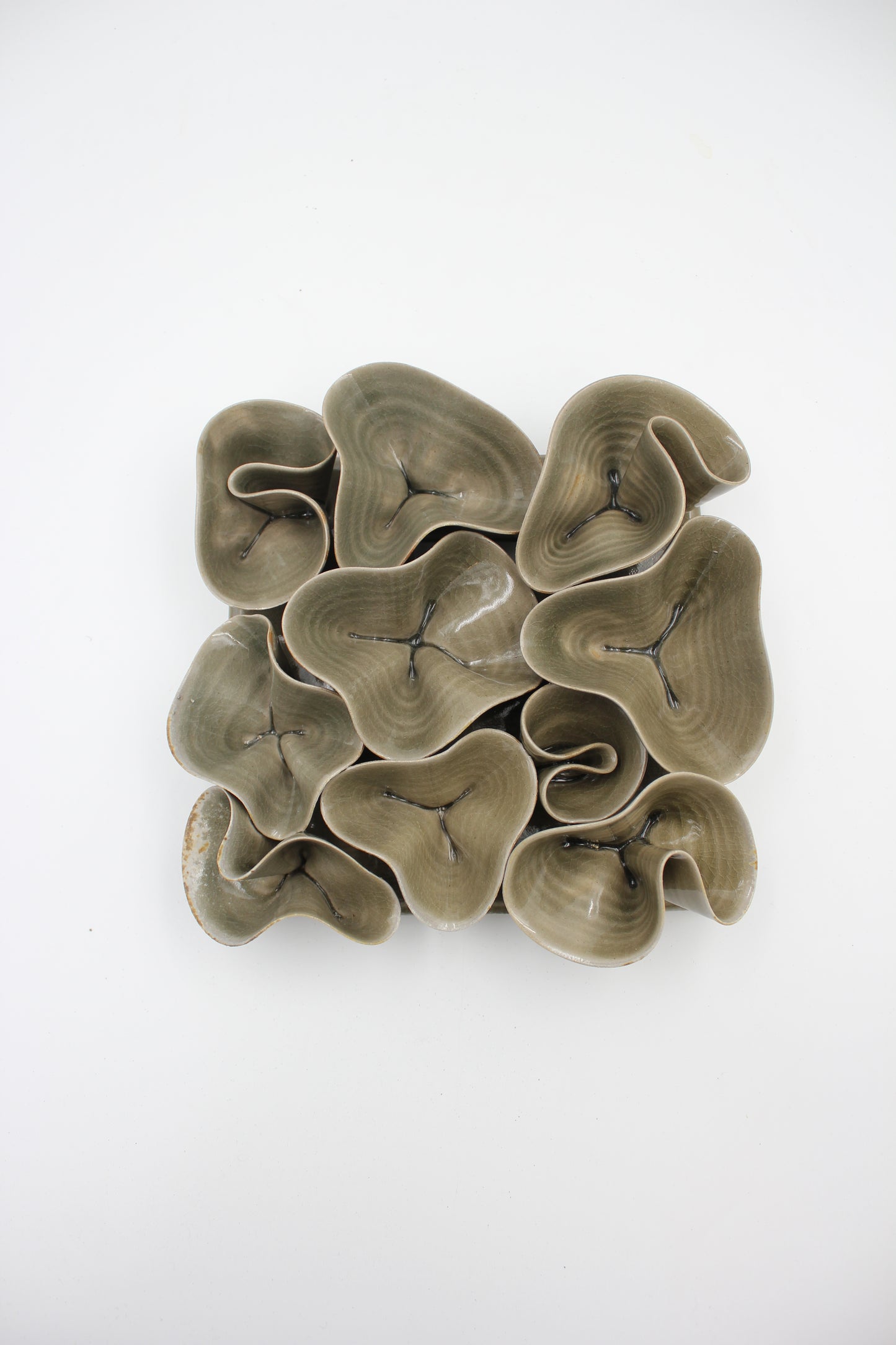 Vägghängd skulptur, Piggelin