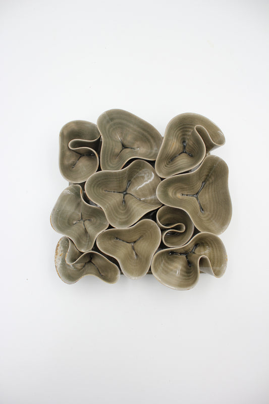 Vägghängd skulptur, Piggelin