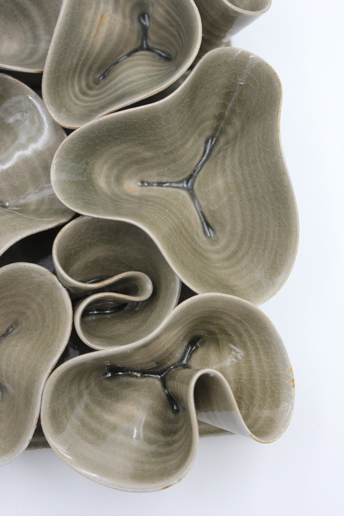 Vägghängd skulptur, Piggelin